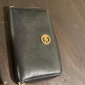 Michael Kors black leather zip around wallet